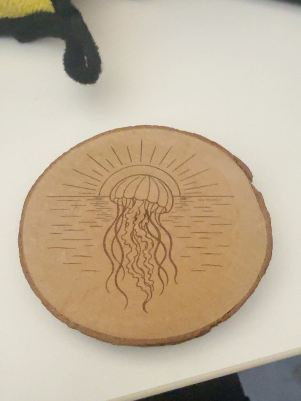 Jellyfish engraved natural wood round