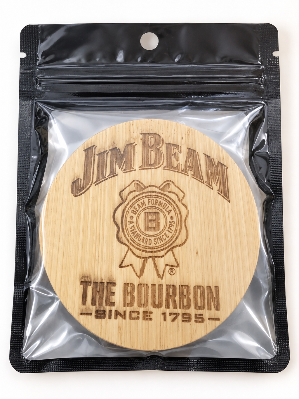Jim Beam engraved wooden bottle opener in retail pouch on clean background