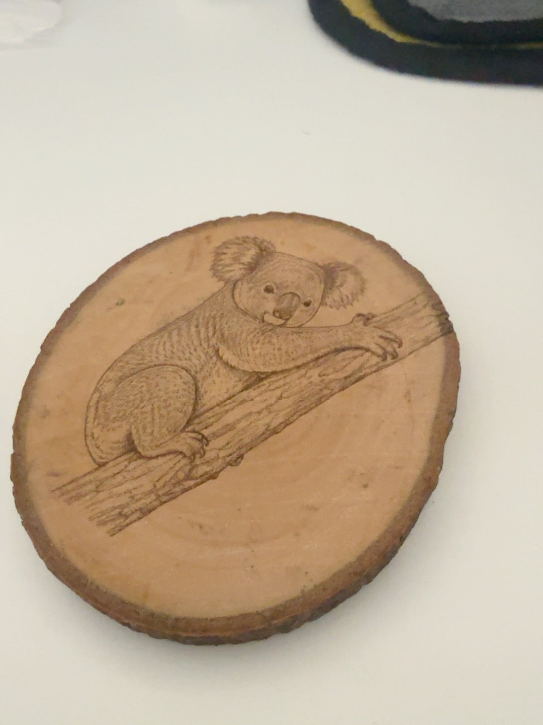 Koala engraved natural wood round