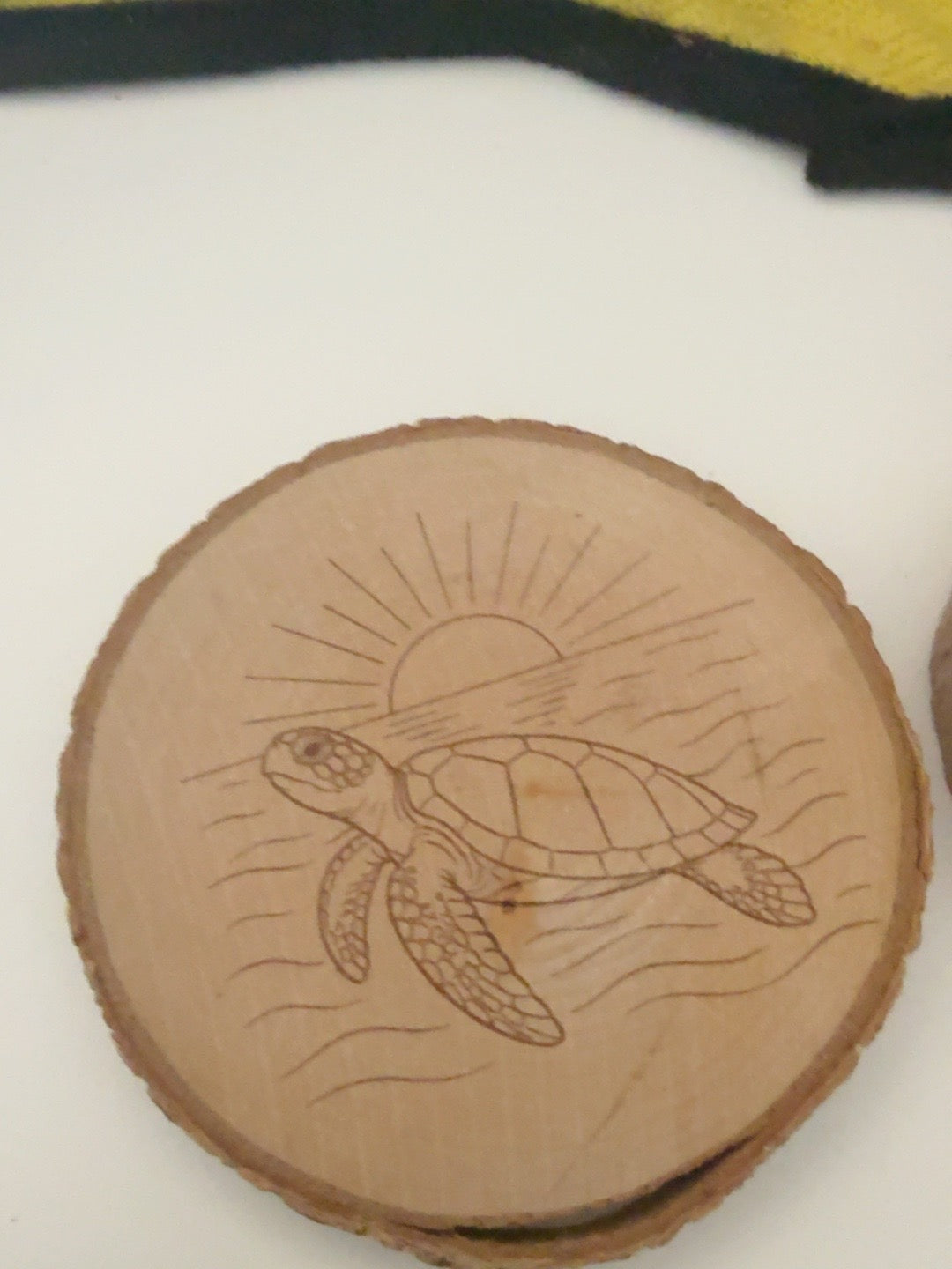Sea turtle engraved natural wood round