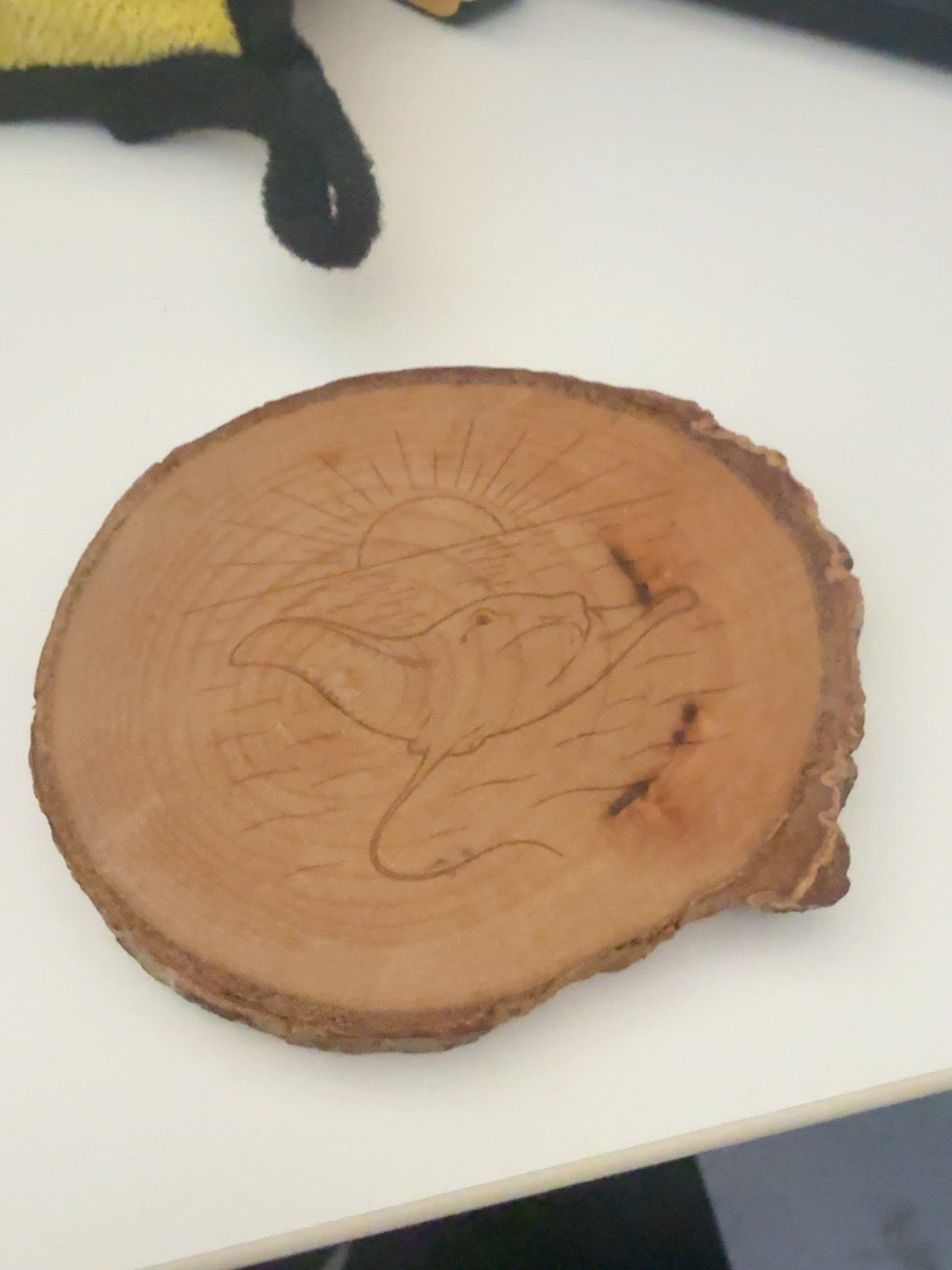 Stingray engraved natural wood round